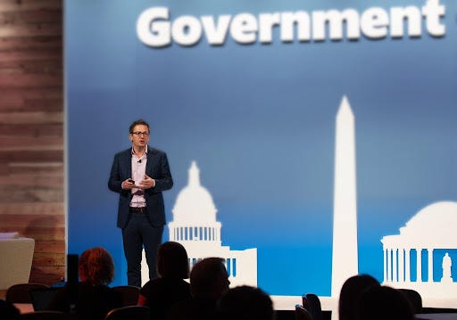How does adoption of the cloud in public services compare to the private sector?